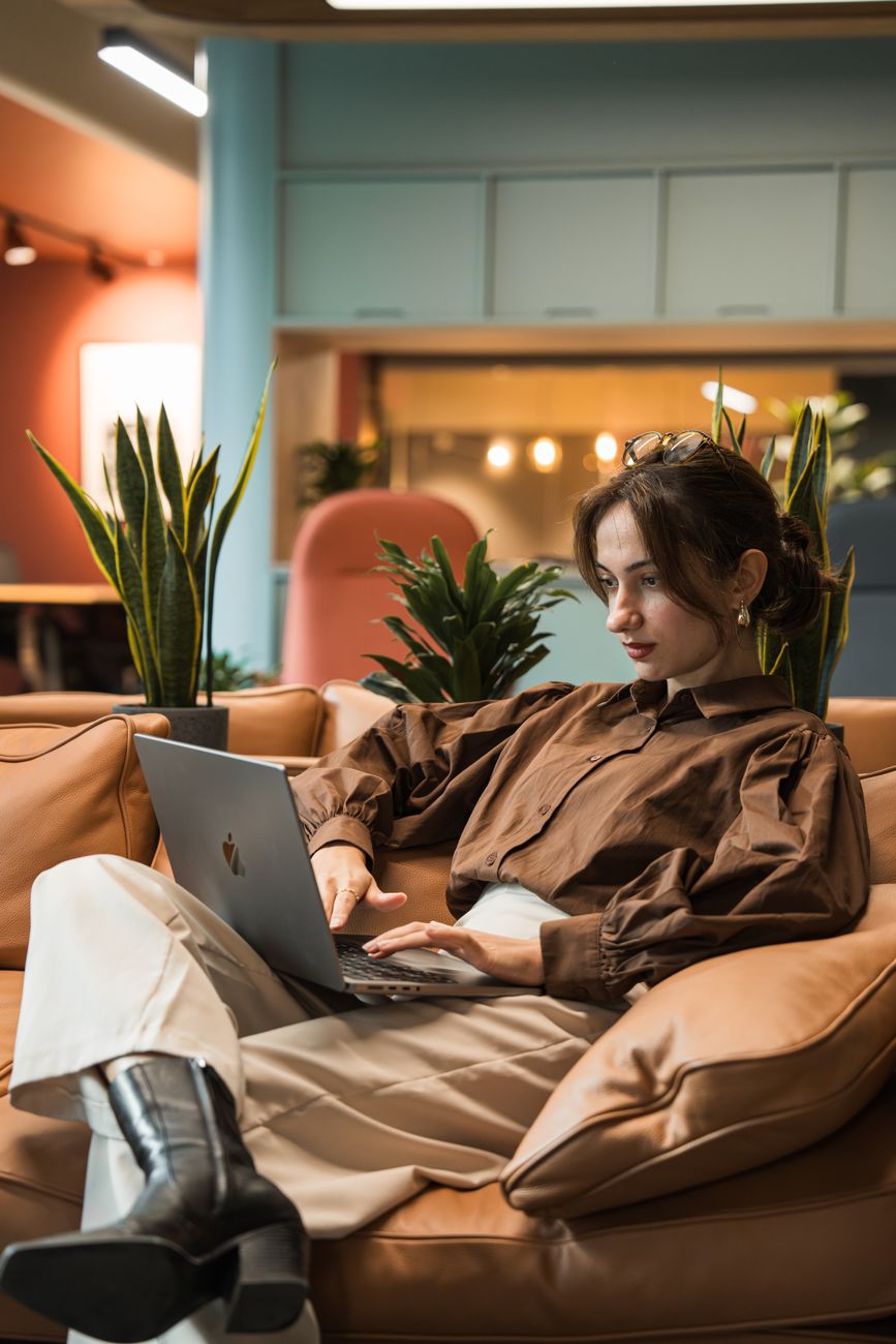 A person learning on a laptop at home